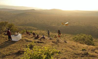 Apéritif au coucher du soleil face à la savane avec avion privé – expérience exclusive sur mesure Horizons Nouveaux