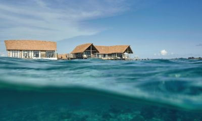Villa sur pilotis du COMO Cocoa Island, hébergement de luxe avec accès direct au lagon, expérience unique au cœur des Maldives.